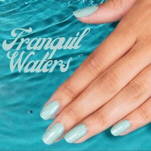 Color Street | Tranquil Waters a turquoise tone encrusted with iridescent flakes